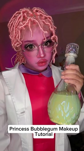 Eden✧˚.⊹ on Instagram: "Princess Bubblegum Makeup Tutorial! Products can be found in b ! o勺 . . . ️ Princess Bubblegum cosplay, costume, #adventuretime #princessbubblegum #makeuptutorial # #dollymakeup #cosplay #blackcosplay #bodypaint #facepaint #cartoonnetwork"