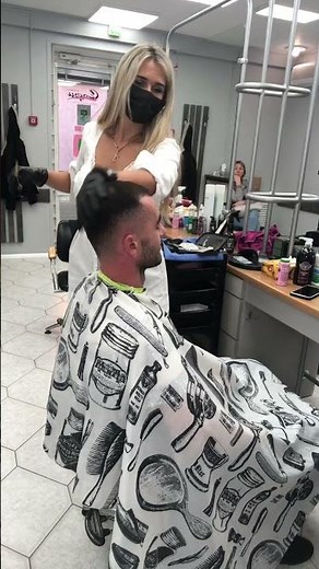 Beautiful Barberette Giving Haircut