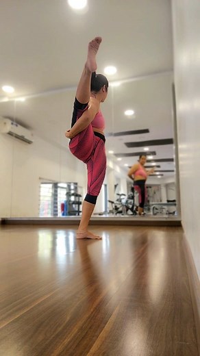 Svarga Dvijasana (Bird of Paradise) A standing posture that opens your hips, strengthens your core and back, and lengthens your hamstrings. This pose can be challenging because it requires both balance and flexibility, so use props as needed. Sometimes I use wall to get into this pose ! #svargadvijasana #balancingpose #flexibility #shoulderopener #wallsupported #birdofparadise #middaypost #viralreels | Seemayogalife