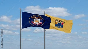 New Jersey and Utah US state flags waving together on cloudy sky, endless seamless loop