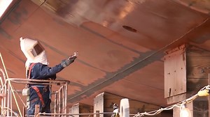 Gray isn’t invisible. So why are all Navy ships painted that way?