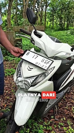 Side insert motorcycle license plate holder
