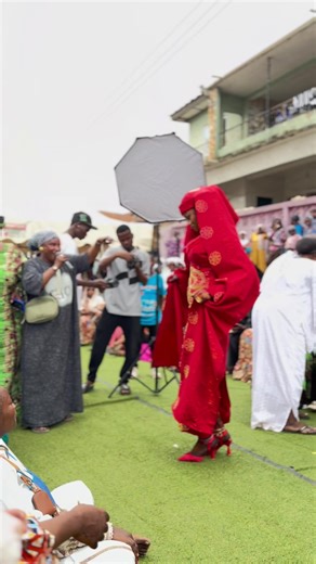 Bride in Red Dress Crafted by Hand