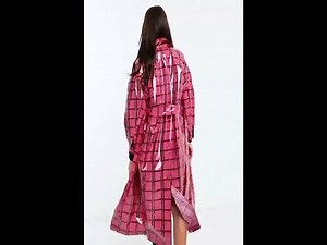 Ladies in PVC Raincoats