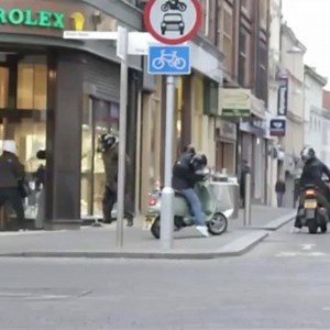 A very brave lady dressed in red stops daylight robbery on Rolex Shop. Must watch | Lawless Britain