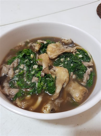 Kabute with ampalaya 1 ½ tbsp oil 1 head garlic 250 gms kabuteng saging 1 cup water 1 tbsp patis A bunch of ampalaya leaves 1 tsp seasoning ganules #Mushroomrecipe #kabutewithampalaya #lutongilocano | Mang Pep's Cuisine