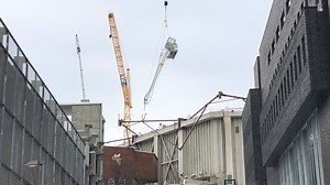 Dome roof construction begins with first pieces of 'crown truss' put in place
