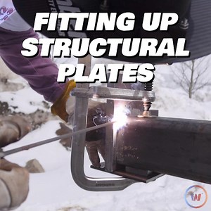 When fitting up structural plates to columns, work smarter, not harder by using a spacer to have your tolerance on the bottom so you can focus on making sure everything is squared up on one side before tacking. Watch the full video where Austin snowboards down to the job site with the ESAB Renegade Volt to weld up these beams https://youtu.be/lVN4j2d74Gk | Weld.com
