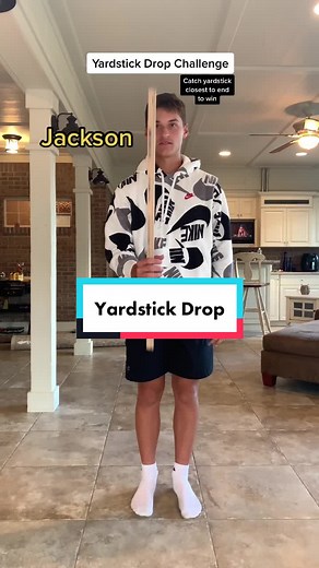 Family Yardstick Drop Challenge Fun Game