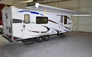 Take a look at the #Lance 2285! This travel trailer is equipped with convenient amenities including a sofa bed, exterior wash station, a stellar curved tinted front window, lite-ply cabinet construction, and so much more. See more of it here: https://goo.gl/TyvULs | Lance Camper