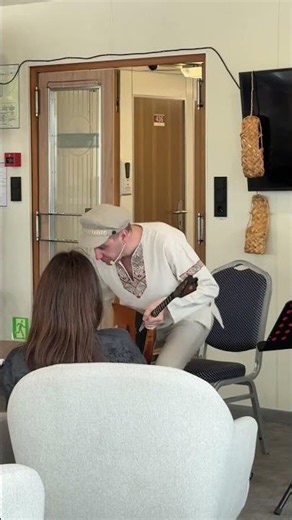 Balalaika player on a ship