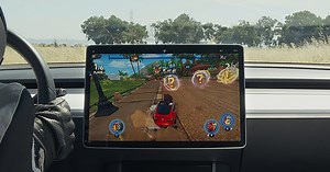 Tesla launches new 'Arcade' app, produces funny commercial with racing game