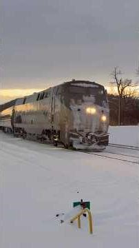 P42DC 132 brings 291 into Hudson covered in snow, P32AC-DM 710 in the rear