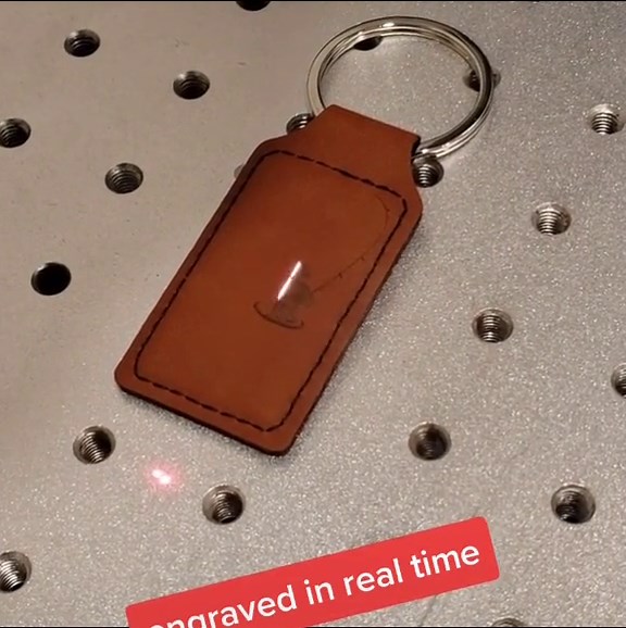 Fiber laser engraving leather. I love the speed and detail I can get out of this machine! #vividengraving #laserengraving #satisfying #leatherwork