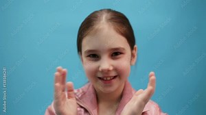 cute young girl clapping