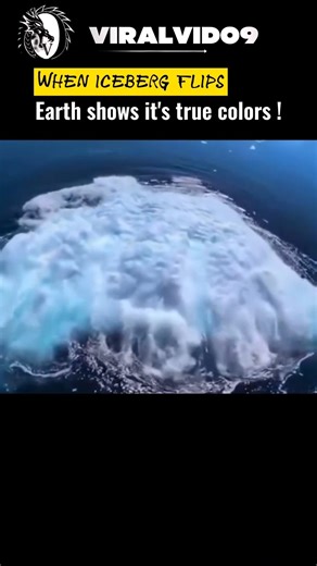 Rare moment captured of iceberg flipping