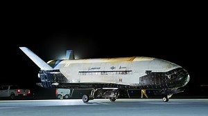 US military's mini space shuttle returns to Earth after orbiting for 434 days on a secret mission