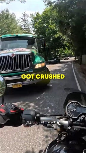 Biker Almost Got Crushed by a Trash Truck