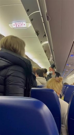 Inside a Diverse Airplane Cabin with Passengers