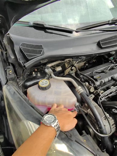 Overheated na Ford Fiesta? Na-solve natin yan! 🚗💨 Dito sa Ford Repair PH San Juan, experts kami sa cooling system fixes! Pinalitan namin ang reservoir tank at hoses para smooth ulit ang biyahe! ❄️ #Ford #FordFiesta #fyp #CoolingSystemFix | Ford Repair PH