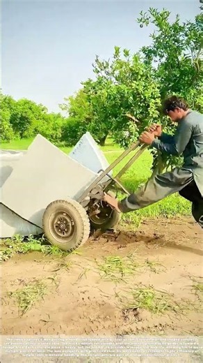 Wheeling the Wedge: How a Hand Truck Transports Concrete Segments Across the Yard