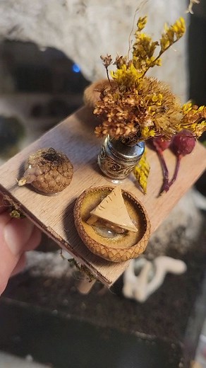 1.3K views · 52 reactions | My favorite part of Creating miniature scenes, Creating a miniature set of chairs and a tiny table, Tiny acorn caps for dishes, and a tiny Bouquet of real flowers.  #miniatureart #miniaturefairy #miniaturefairyhouse #miniaturehouse #tinyhouse #fairyhouses #fairyhouse #handmadeart | Infinitecreator | Facebook