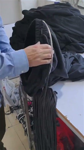 Installing a waistband drawstring. #sewingprocess #tailor #precisionwork #fyp