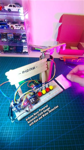 Using a wet tissue to test an arduino nano-powered automatic cloth hanger with rain and water detection! https://linktr.ee/excellentarts #arduino #rainsensor #steppermotor #automaticclothhanger #stem | Excellent Arts