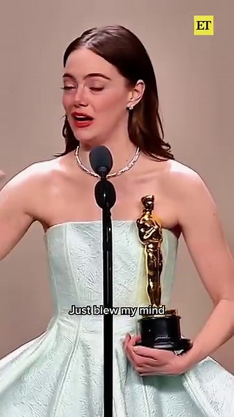 Emma Stone shared that she had to be sewn back into her dress after ripping it while dancing to Ryan Gosling's Oscar performance. | Entertainment Tonight