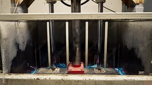 close-up Special garbage compactor machine presses large garbage bag for waste disposal at waste recycling station