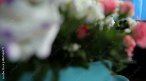 bride dresses garter on the leg. Picture of beautiful female barefoot legs in wedding dress