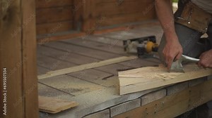 wood processing. a man works with an axe. close-up of an axe. slow-motion video. Record high quality video in Full HD format.