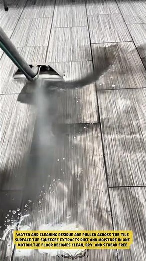 Tile floor drying process using squeegee to clear water and cleaning residue