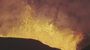 Molten yellow lava from a erupting volcano - Free Stock Video