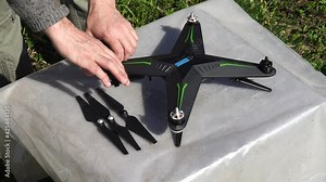 Installing the propellers on the drone. 4K.