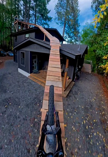 E-bike up & off my house 🏡 Went DEEP 💥 I love building stunts, mountain biking, and pushing myself for free ride #mtb #freeride #gopro #diy #homereno