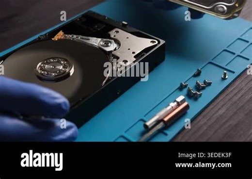 repairman fixing computer hard disk drive in service center Stock Video Footage - Alamy