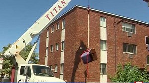 Piano delivered by crane to viral video's mystery player