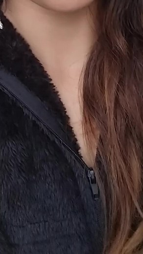 Close-Up Beauty: Stylish Black Fuzzy Jacket Looks