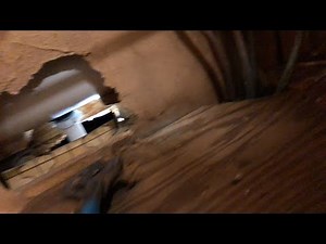 Shower drain pipe under mobile home repaired