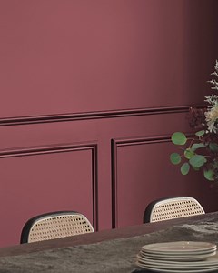 Our 2025 Color of the Year, Rumors, is a deep red that brings warmth and elegance to spaces, creating a timeless atmosphere. | BehrPaint
