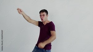 Super excited guy student, caucasian, european man celebrating winning bid. Excited male man shaking hands, dancing and jumping celebrating success, big ball eyes