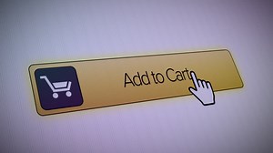 Clicking on an Add to Cart button with a mouse pointer | Premium Stock Video Footage