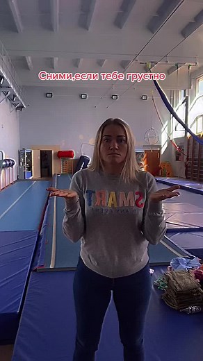 Gymnastics Training Techniques Demonstrated in a Gym