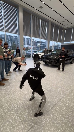 Humanoid Robot in Kia Hoodie Topples Mid-Performance
