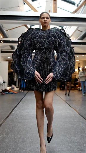 Rahul Mishra on Instagram: "Earth is foundation and memory. It holds time, layers, and quiet strength. In this expression, embroidery becomes terrain— light sediment settling over form, transparencies rising like distant mountains, silhouettes shaped by gravity and patience. Every layer is an archive. Every surface remembers. Earth does not move loudly. It endures. Rahul Mishra Couture Spring 2026 collection, ‘ALCHEMY’ at Haute Couture Week 2026 in Paris @hautecoutureweek Jewellery Partner @tani