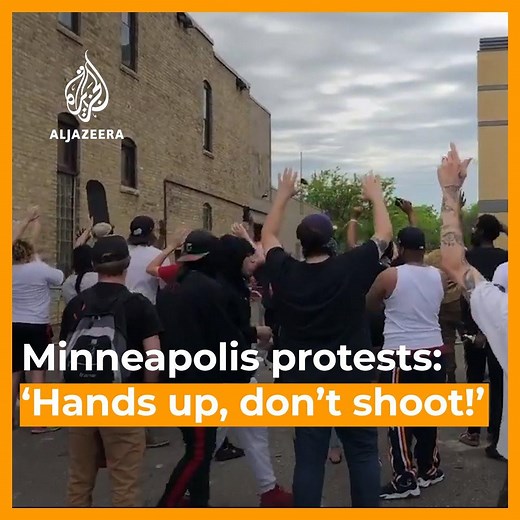 ‘Hands up, don’t shoot!’ | Protesters outside the Minneapolis Police’s 3rd Precinct rallied against the killing of unarmed black man George Floyd. | Al Jazeera English