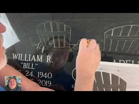 Hand etching on gravestone