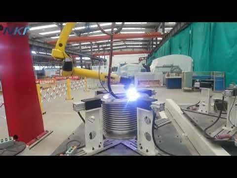 Automated welding cell by our gantry system synchronized with fanuc robot.