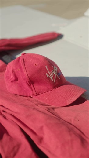 25 years in the making 🙌✈️ With our 25th birthday coming up, here’s a throwback to Pit Crew fashion in the 2000s 👀 | Virgin Australia